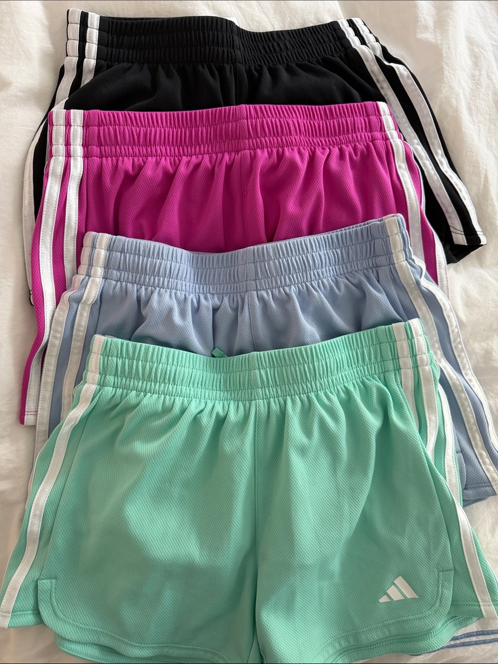 Adidas girls 4 pairs Shorts with White Stripes
All size 14 /L